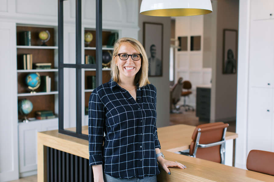 woman standing in dentist office waiting room