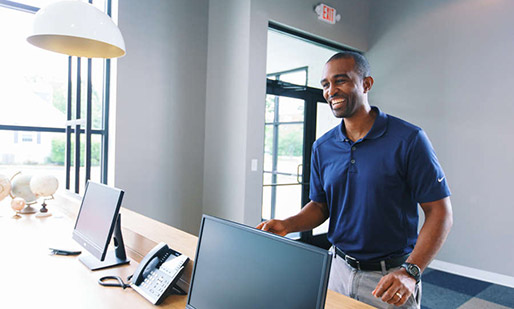 adult man standing checking-in at dentist appointment